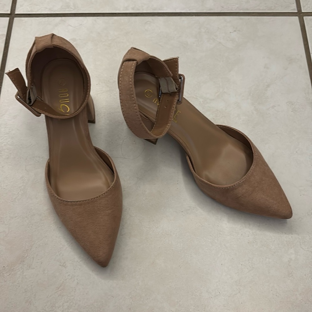 Tan colored heels, bought from rainbow, worn once.